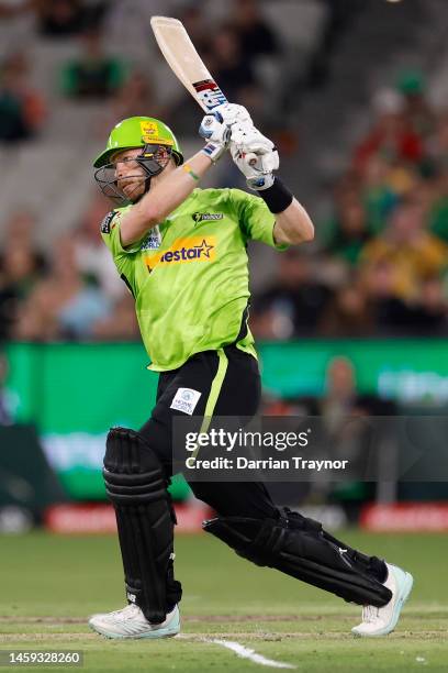 Nathan McAndrew of the Thunder hits the winning runs during the Men's Big Bash League match between the Melbourne Stars and the Sydney Thunder at...