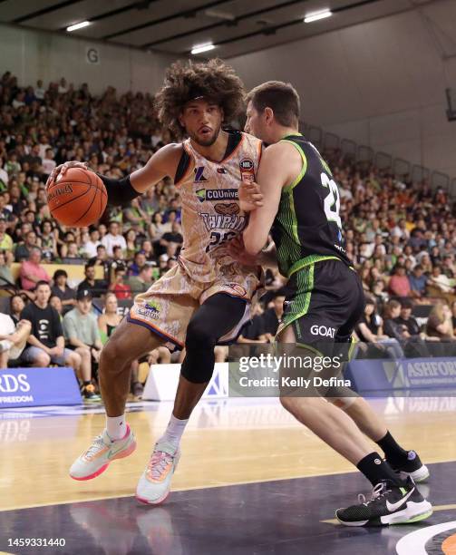 Keanu Pinder of the Taipans in action against Dane Pineau of the Phoenix during the round 17 NBL match between South East Melbourne Phoenix and...