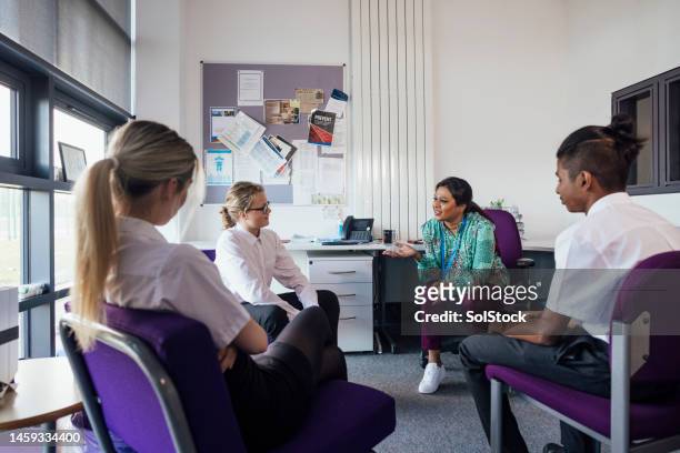 group discussion with teacher - debate stock pictures, royalty-free photos & images