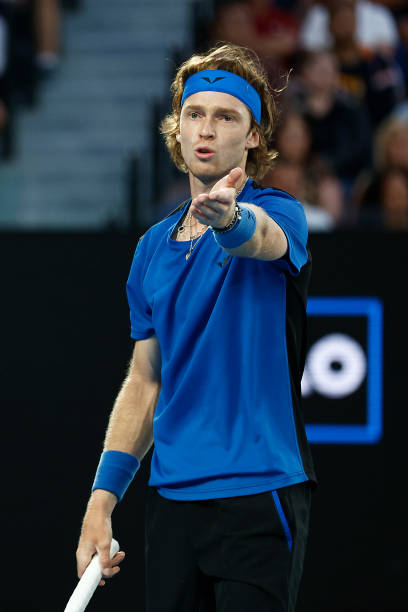 Andrey Rublev reacts in the Quarterfinal singles match against Novak Djokovic of Serbia during day ten of the 2023 Australian Open at Melbourne Park...