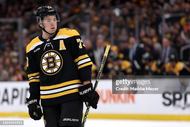 Charlie McAvoy of the Boston Bruins looks on during the first period against the San Jose Sharks at TD Garden on January 22, 2023 in Boston,...