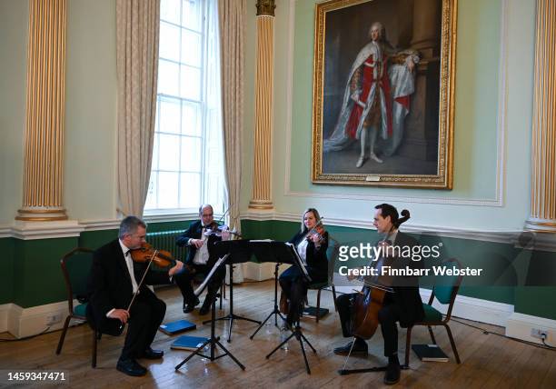 String quartet provided music for Camilla, Queen Consort during the visit to the Royal Osteoporosis Society reception at the Guildhall, on January...