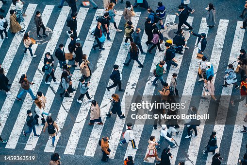 People walking at Shibuya crossing, Tokyo People walking at Shibuya crossing, Tokyo