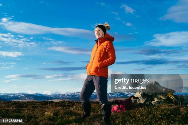 relaxing at the summit - scottish coat stock pictures, royalty-free photos & images