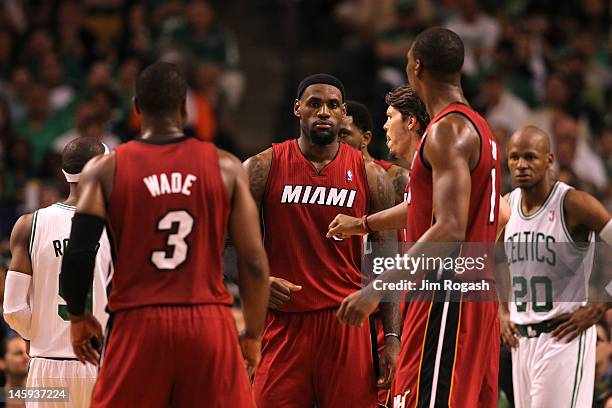 Dwyane Wade, LeBron James and Chris Bosh of the Miami Heat react against the Boston Celtics in Game Six of the Eastern Conference Finals in the 2012...
