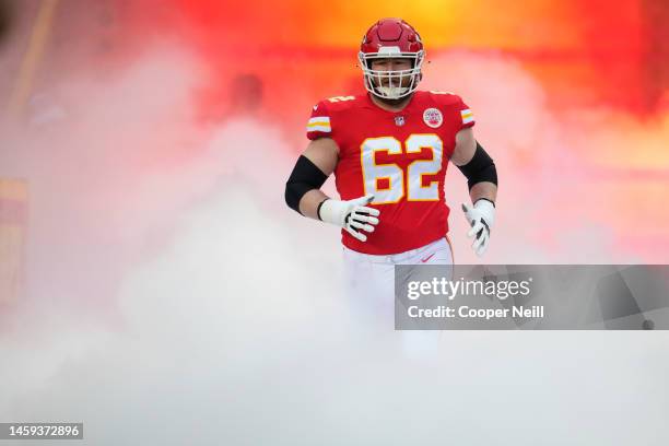 Joe Thuney of the Kansas City Chiefs runs onto the field during introductions against the Jacksonville Jaguars at GEHA Field at Arrowhead Stadium on...