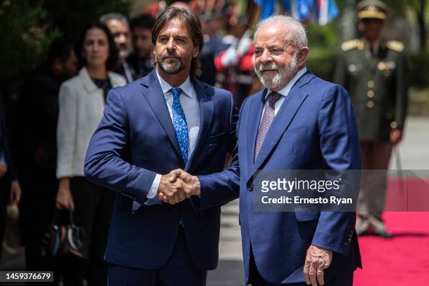 Luis Lacalle Pou president of Uruguay and Luiz Inácio Lula Da Silva president of Brazil shake hands during an official visit to Uruguay on January...