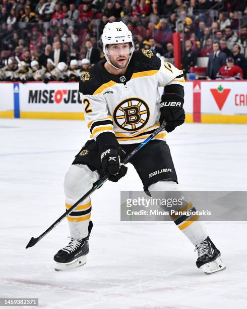 Craig Smith of the Boston Bruins skates during the first period against the Montreal Canadiens at Centre Bell on January 24, 2023 in Montreal,...