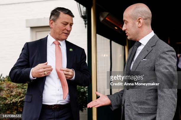 Rep. Ronny Jackson shakes hands with Stephen Miller, a former senior advisor for policy to President Donald Trump, as they leave a GOP caucus meeting...