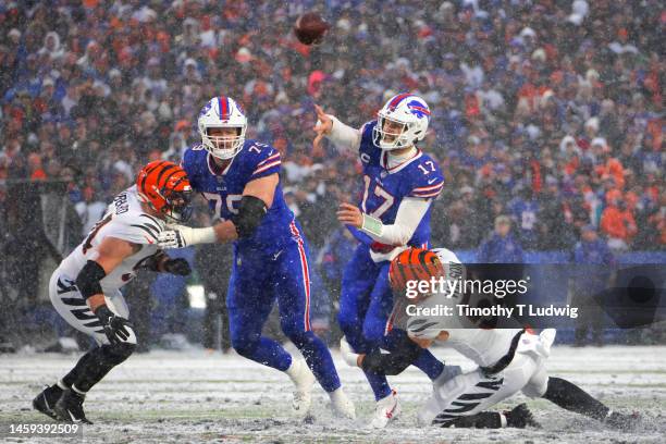 Josh Allen of the Buffalo Bills throws a pass against the Cincinnati Bengals during the second half in the AFC Divisional Playoff game at Highmark...