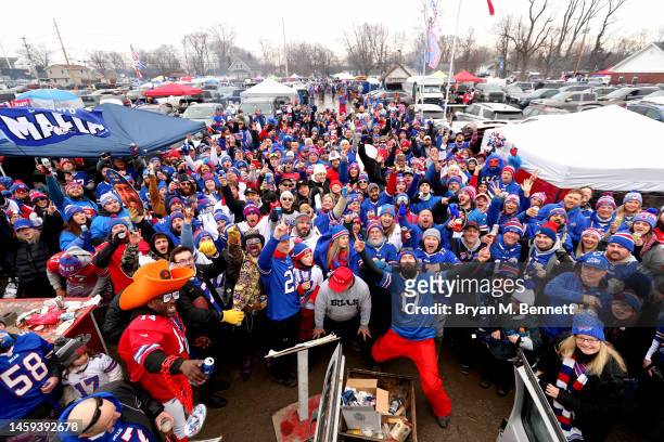Buffalo Bills fans tailgate in the parking lot prior to the AFC Divisional Playoff game between the Cincinnati Bengals and the Buffalo Bills at...