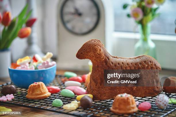fresh baked easter lamb cake in domestic kitchen - easter lamb stock pictures, royalty-free photos & images