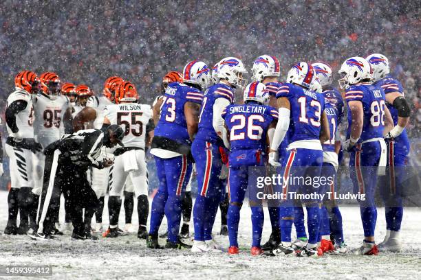 The Buffalo Bills offense huddle during the second half against the Cincinnati Bengals in the AFC Divisional Playoff game at Highmark Stadium on...