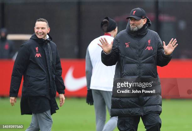 Pepijn Lijnders an Jurgen Klopp manager of Liverpool during a training session at AXA Training Centre on January 25, 2023 in Kirkby, England.