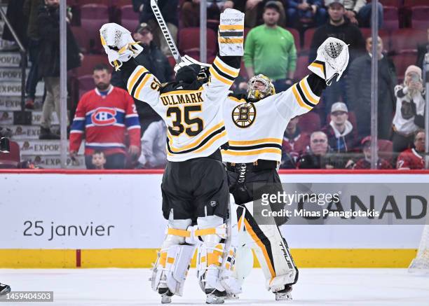 Linus Ullmark and Jeremy Swayman of the Boston Bruins celebrate their victory against the Montreal Canadiens at Centre Bell on January 24, 2023 in...