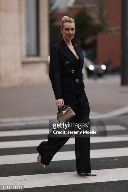 Marina von Lison seen wearing Hermes mini Kelly beige leather bag, Alexandre Vauthier sparkling transparent heels and Nicolas Besson matching suit...