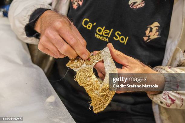 Ca' Del Sol store owner prepares masks in anticipation of the start of carnival on January 25, 2023 in Venice, Italy. Hamid Bandar was born in Iran...