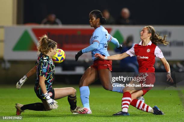 Khadija Shaw of Manchester City is challenged by Olivia Clark and Naomi Layzell of Bristol City during the FA Women's Continental Tyres League Cup...