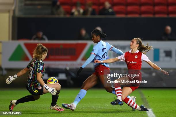 Khadija Shaw of Manchester City is challenged by Olivia Clark and Naomi Layzell of Bristol City during the FA Women's Continental Tyres League Cup...