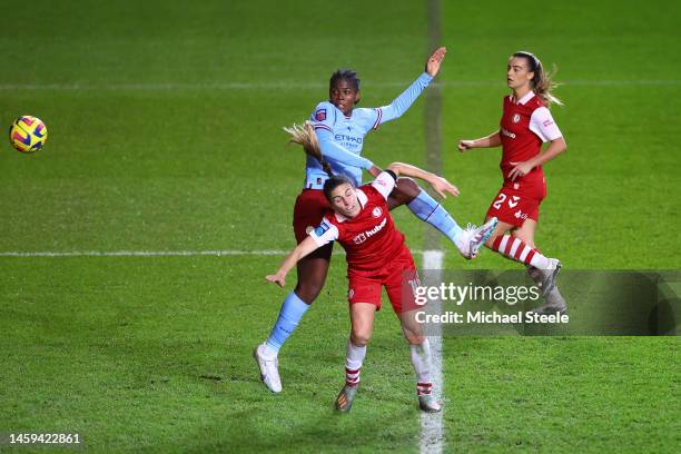 Khadija Shaw of Manchester City is challenged by Vicky Bruce of Bristol City during the FA Women's Continental Tyres League Cup match between Bristol...