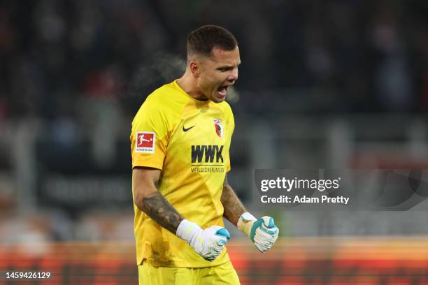 Rafal Gikiewicz of FC Augsburg celebrates a goal which was later ruled out by the Video Assistant Referee during the Bundesliga match between FC...