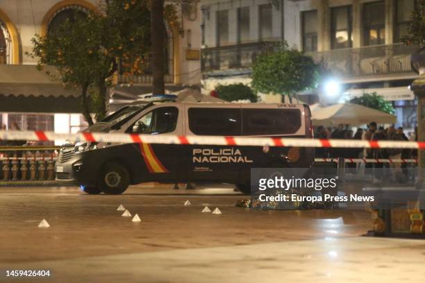 Medical and police officers cover the body of the sacristan killed in an attack on different churches on January 25, 2023 in Algeciras, Cadiz . The...