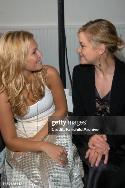 Actress and singer Mandy Moore and actress Jaime King attend Behnaz Sarafpour's spring 2006 runway show at Drive-In Studios.