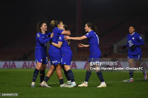 Fran Kirby of Chelsea celebrates with teammates after scoring her team's second goal during the FA Women's Continental Tyres League Cup match between...