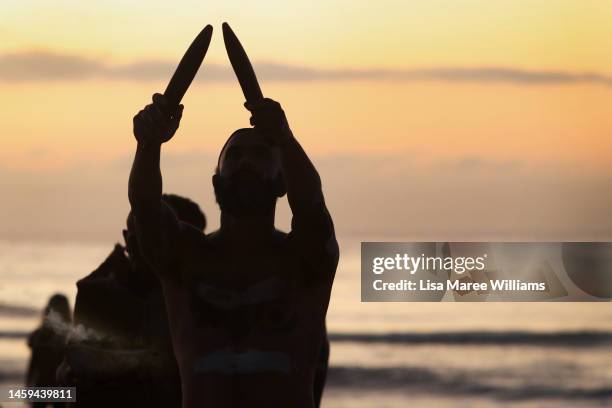 First Nations Elder Dean Kelly and Yuin Gurandgi dancers lead a Dawn Reflection and Smoking Ceremony at Bondi Beach on January 26, 2023 in Sydney,...