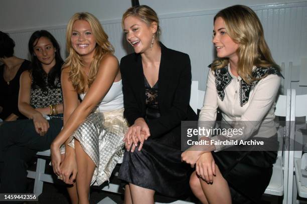 Actress and singer Mandy Moore, actress Jaime King and Amanda Hearst attend Behnaz Sarafpour's spring 2006 runway show at Drive-In Studios.
