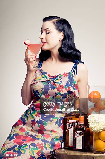 Dita Von Teese poses for a portrait at the Cointreau and Dita Von Teese Launch Summer Bar Cart Cocktail Program at Poolside Soiree on June 7, 2012 at...
