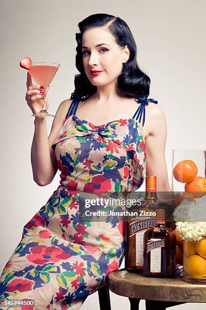 Dita Von Teese poses for a portrait at the Cointreau and Dita Von Teese Launch Summer Bar Cart Cocktail Program at Poolside Soiree on June 7, 2012 at...