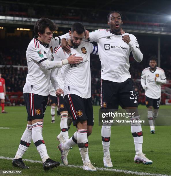 Bruno Fernandes of Manchester United celebrates scoring their third goal during the Carabao Cup Semi Final 1st Leg match between Nottingham Forest...