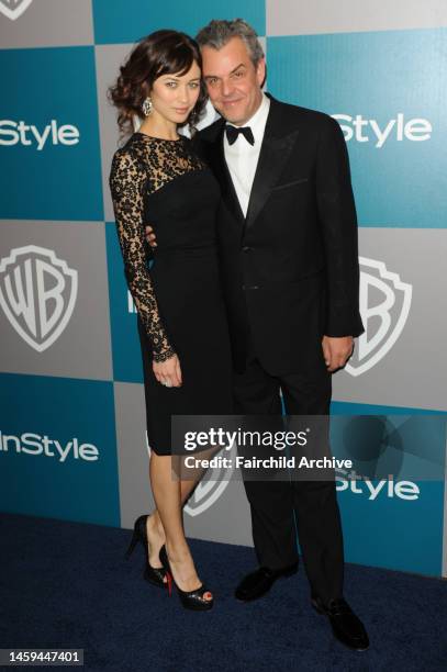 Olga Kurylenko and Danny Huston attend Warner Bros. And InStyle's 13th annual Golden Globe Awards after party at the Beverly Hilton.