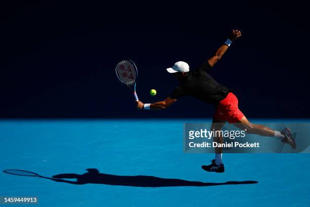 Gonzalo Escobar of Ecuador plays a backhand during the round three men's doubles match against Rinky Hijikata of Australia and Jason Kubler of...
