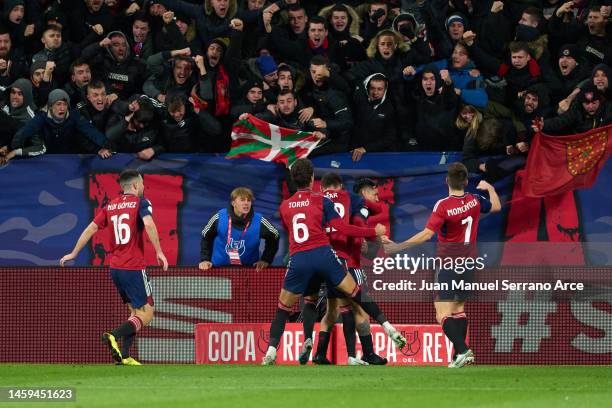 Chimy Avila of CA Osasuna celebrates with teammates after scoring their side's first goal during the Copa del Rey Quarter Final match between CA...