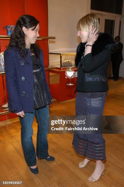 Cecilia Becker and Amy Astley attend Teen Vogue and Victoria Traina's holiday shopping event at Hogan Spring Street.