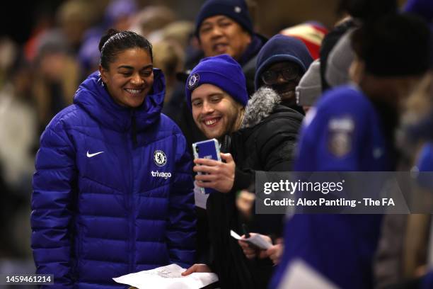 Jess Carter poses for a selfie with fans after the match during the FA Women's Continental Tyres League Cup match between Tottenham Hotspur and...