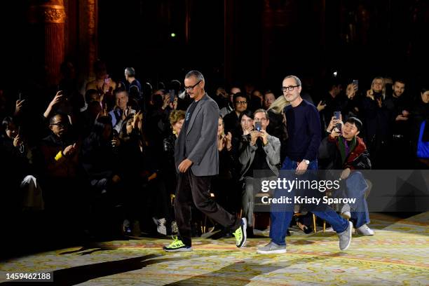 Designers Viktor Horsting and Rolf Snoeren acknowledge the audience during the Viktor & Rolf Haute Couture Spring Summer 2023 show as part of Paris...