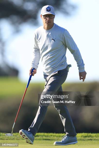 Ben Crane watches his putt on the 7th hole of the South Course during the first round of the Farmers Insurance Open at Torrey Pines Golf Course on...