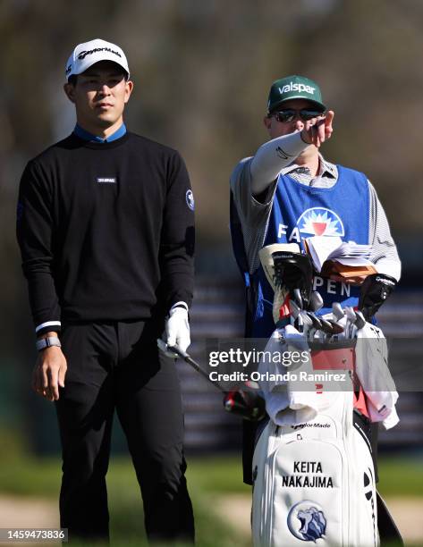 Keita Nakajima of Japan prepares to hit his first shot on the 14th hole of the North Course during the first round of the Farmers Insurance Open at...