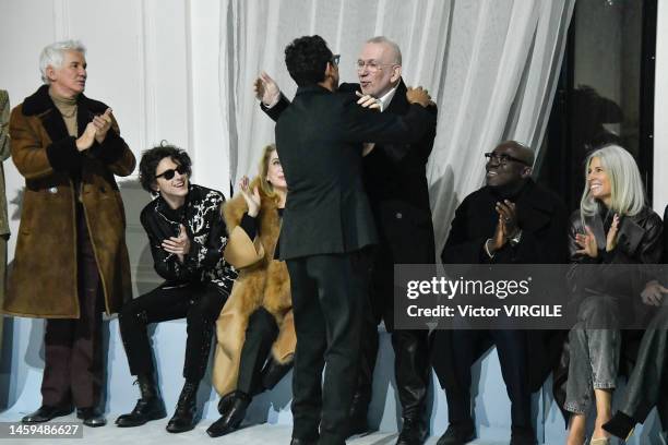 Fashion designers Jean Paul Gaultier and Haider Ackermann surrounded by Baz Luhrmann, Timothée Chalamet and Catherine Deneuve during the Jean Paul...