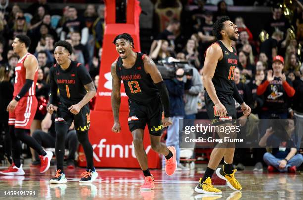 Jahmir Young, Hakim Hart and Patrick Emilien of the Maryland Terrapins celebrate in the second half against the Wisconsin Badgers at Xfinity Center...