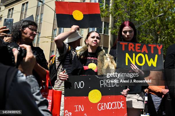 Protesters participate in the Treaty Before Voice Invasion Day Protest outside Parliament House on January 26, 2023 in Melbourne, Australia....