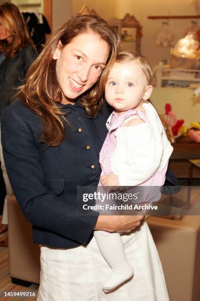 Allison Waterman and daughter Olivia attend Saks Fifth Avenue's Lucy Sykes Baby launch.