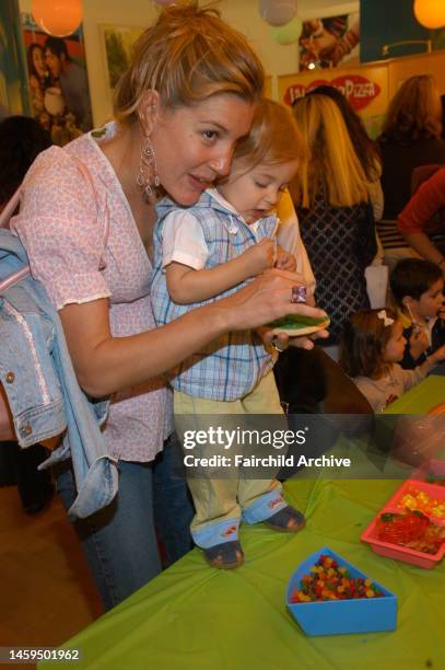 Marisa Noel Brown and Ford Brown attend Lenox Hill Neighborhood House's 'Kids In Candyland' at Dylan's Candy Bar.