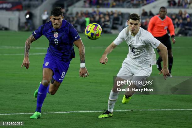 Brandon Vazquez of the United States chases after the ball against Ranko Vesellnovic of Serbia during the first half in the International Friendly...