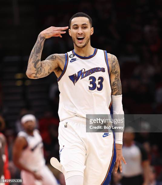 Kyle Kuzma of the Washington Wizards reacts after making a three point basket during the fourth quarter against the Houston Rockets at Toyota Center...