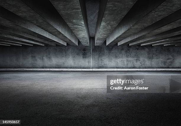 concrete parking lot - abandoned warehouse stock-fotos und bilder