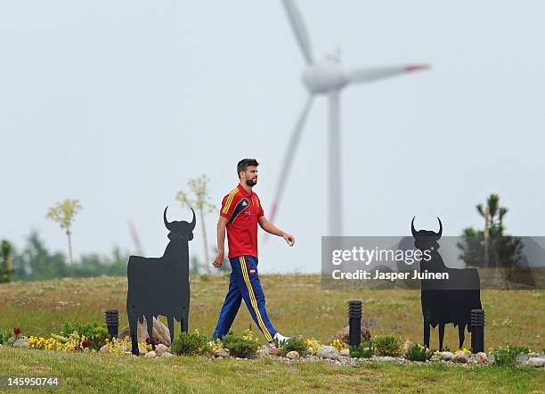 Gerard Pique of Spain walks the team hotel premises on his way to a training session ahead of UEFA EURO 2012 on June 8, 2012 in Gniewino, Poland.